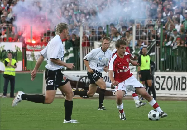 Jack Wilshere of Arsenal Faces Off Against Andras Kaj of Szombathely in 2008