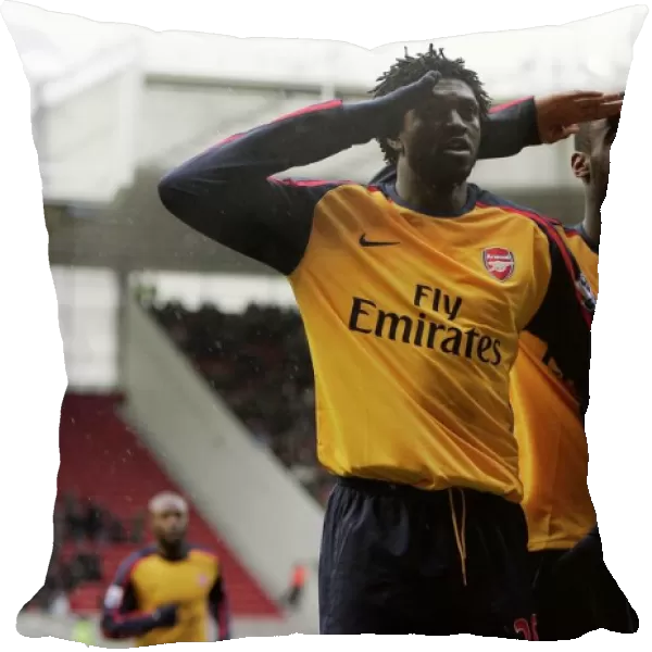 Emmanuel Adebayor celebrates scoring Arsenals goal
