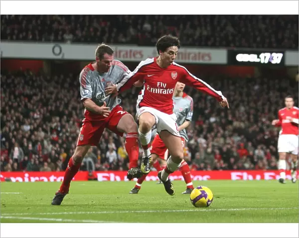 Samir Nasri (Arsenal) Jamie Carragher (Liverpool)
