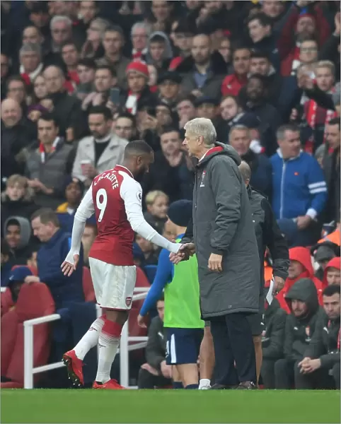 Arsene Wenger and Alexandre Lacazette: A Heartfelt Farewell on the Arsenal Touchline (Arsenal v Tottenham Hotspur 2017-18)