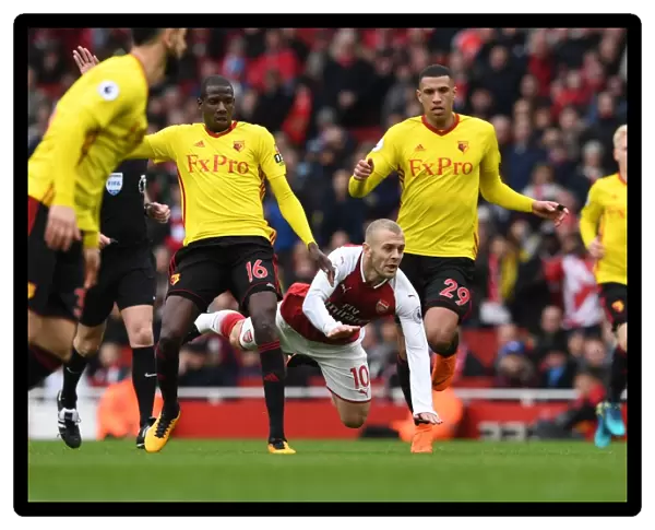 Arsenal vs. Watford: Wilshere Tripped by Capoue and Doucoure