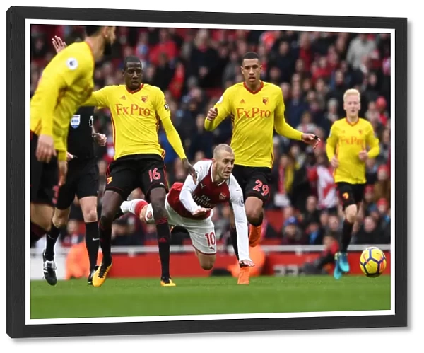 Arsenal vs. Watford: Wilshere Tripped by Capoue and Doucoure