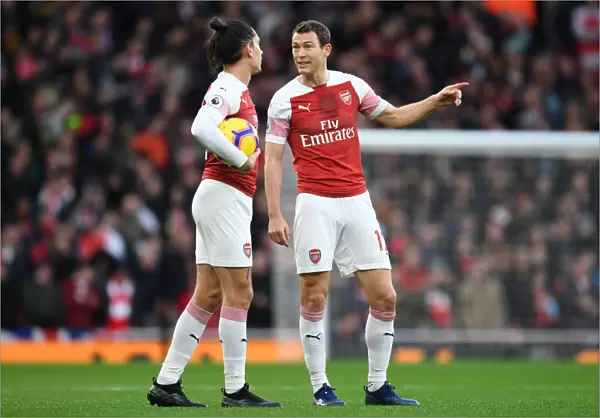 Arsenal FC: Bellerin and Lichtsteiner in Action against Huddersfield Town (2018-19)