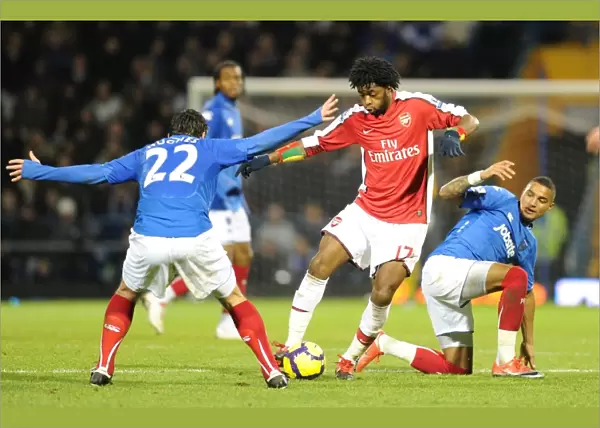 Alex Song (Arsenal) Richard Hughes and Kevin Prince Boateng (Portsmouth)