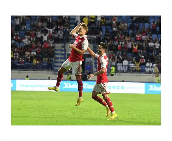 Arsenal's Odegaard and Vieira Celebrate First Goals in Arsenal's Win Against AC Milan in Dubai Super Cup, 2022-23