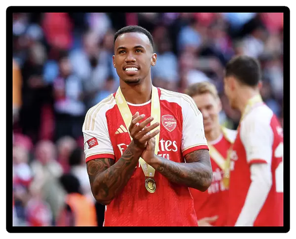 Arsenal's Gabriel Leads Victory Celebrations: Community Shield Triumph over Manchester City (2023-24)
