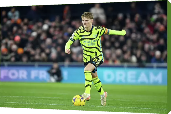 Martin Odegaard Charges Forward: Luton Town vs. Arsenal FC, Premier League 2023-24