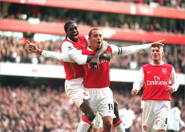Gilberto celebrates scoring his 2nd and Arsenals 3rd from the penalty spot with Emmanuel Adebayor. Arsenal 3: 1 Tottenham Hotspur. FA Premiership. Emirates Stadium, London, 2  /  12  /  06. Credit: Arsenal Football Club  / 