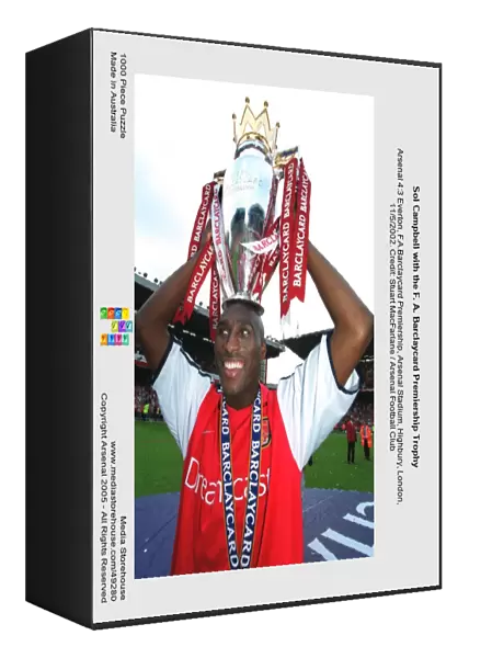 Sol Campbell with the F. A. Barclaycard Premiership Trophy