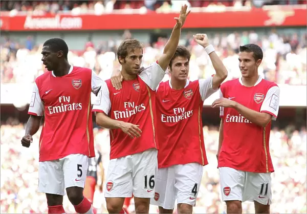 Mathieu Flamini celebrates scoring Arsenals 1st goal with Kolo Toure