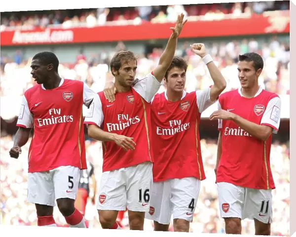 Mathieu Flamini celebrates scoring Arsenals 1st goal with Kolo Toure