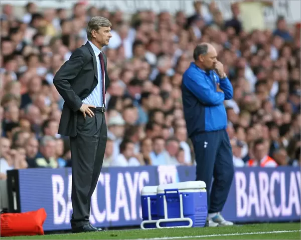 Arsenal manager Arsene Wenger and Tottenham manager Martin Jol during the match