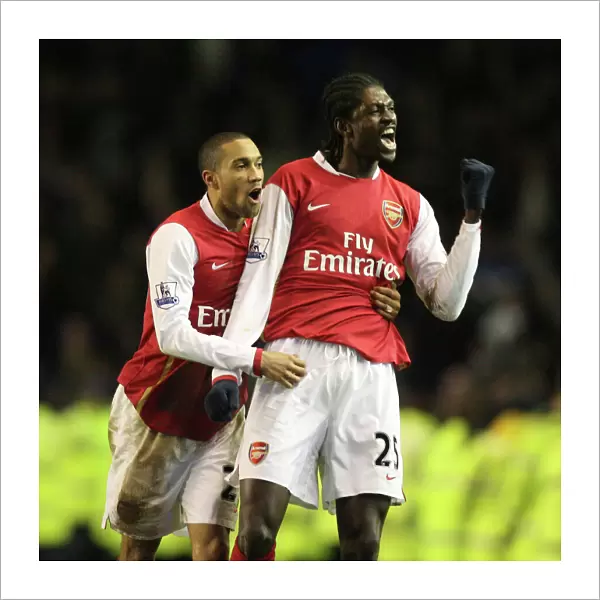 Emmanuel Adebayor and Gael Clichy celebrate Arsenals win at the end of the match