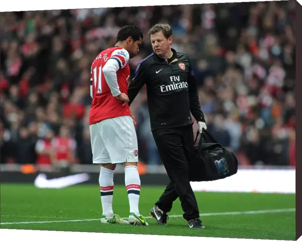 Andre Santos (Arsenal) with Colin Lewin the Arsenal Physio. Arsenal 5: 2 Tottenham Hotspur