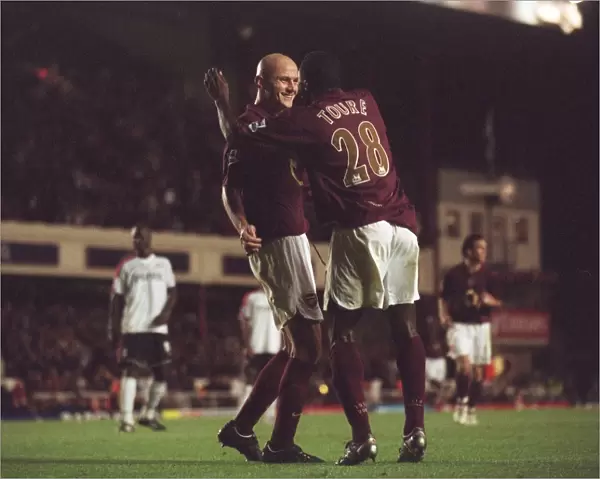 Pascal Cygan celebrates scoring his 2nd and Arsenals 4th goal with Kolo Toure