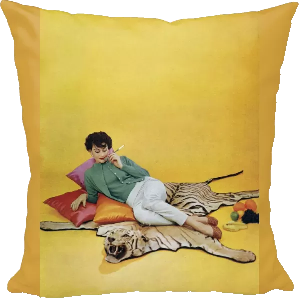 Lyle and Scott 1950s UK womens knitwear woman tigers skin rugs