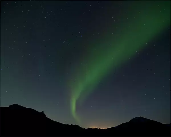 A glimpse of Northern Lights on a winter night in Iceland 5