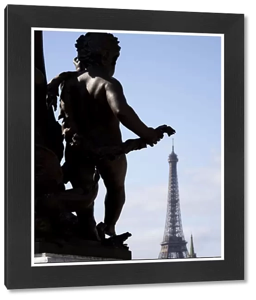 The Eiffel Tower, Paris, with statues on the Place de la Concorde