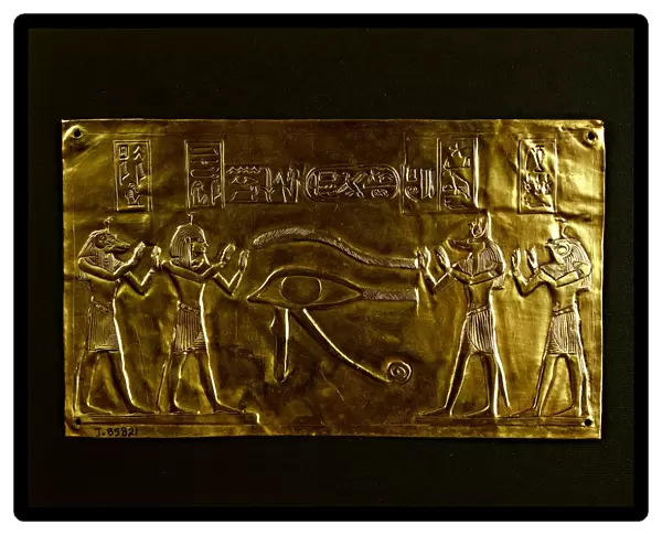 Gold plate for the mummy of Psusennes I. Relief representing Horus udjat eye and the four sons of Horus, Imset, Duamutef, Hapi, Qebehsenuef from Tanis, tomb of Psusennes I
