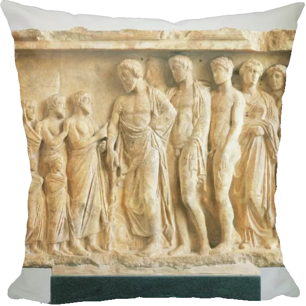 God Asclepius accompanied by his children before a family of devotees, votive marble relief