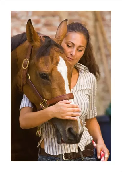 Europe. Italy. Tuscany. Siena. Palio Race. Contrada of Giraffa. Stable. Ms Claudia Colonna. the First Woman in the Palio Race History Holding the Rule of Barbaresco. the Person Who Has Care of the Horse on Palio Time. July