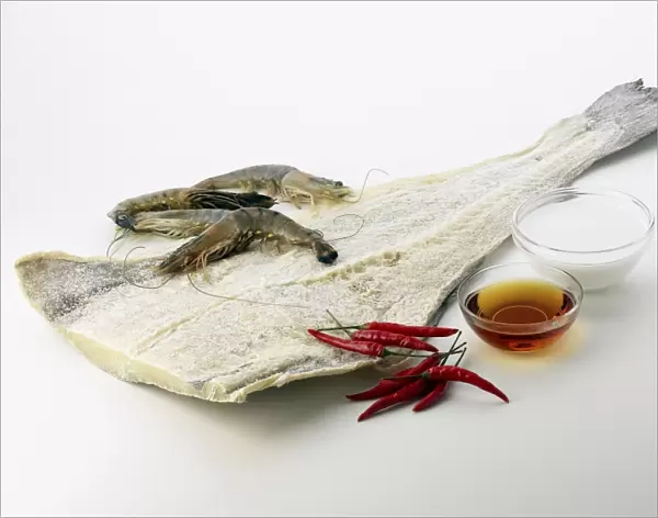 Dried cod (bacalhau), king prawns, fish sauce, coconut milk and fresh chillies, ingredients typical for Chinese-Macanese cuisine