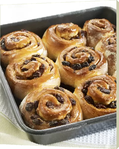 Chelsea buns in baking tray, close-up
