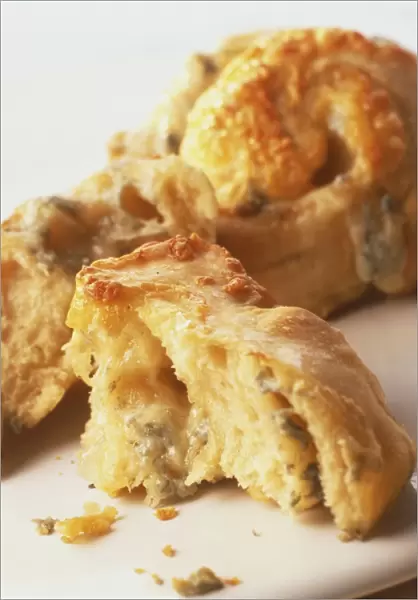 Fluffy pastry rolls with cheese crust and gorgonzola filling
