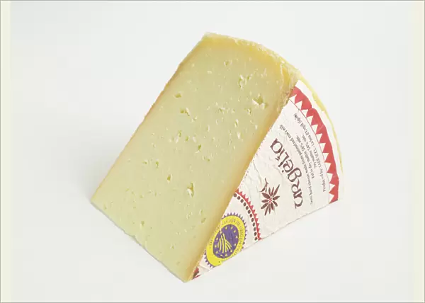 Slice of Spanish L Alt Urgell y La Cerdanya DOP cows milk cheese