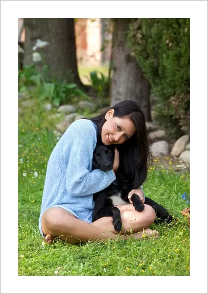 A Girl Embracing a Dog