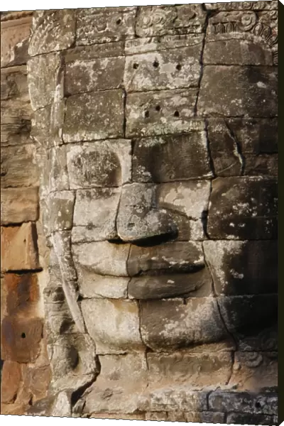 Stone faces on towers in the Bayon Temple at Angkor Thom which may depict Jayavarman VII as a bodhisattva
