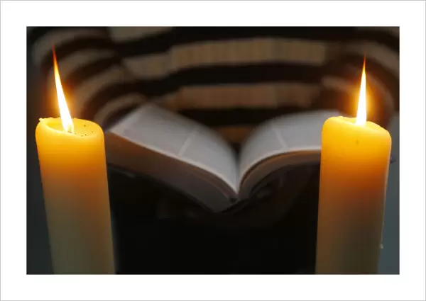 Bible and 2 candles