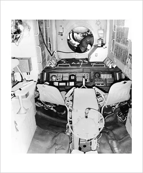 The interior of the salyut 1 space station with the hatchway leading to the soyuz 11 spacecraft, june 1971