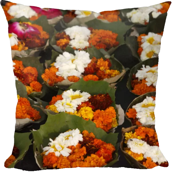 Diyas (floral floats) for sale on Rishikesh ghats