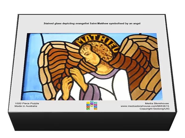 Stained glass depicting evangelist Saint-Matthew symbolised by an angel