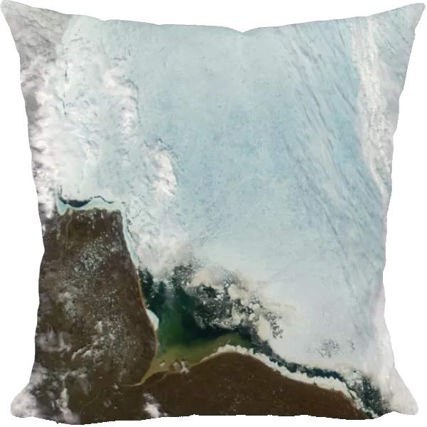satellite view over Hudson Bay, Canada. Large ice flow is shown over the bay