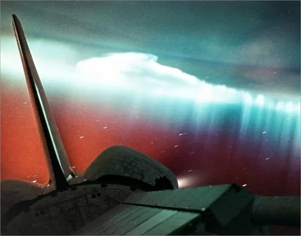 Aurora Australis (curtain form) viewed from Space Shuttle Endeavour, part of which