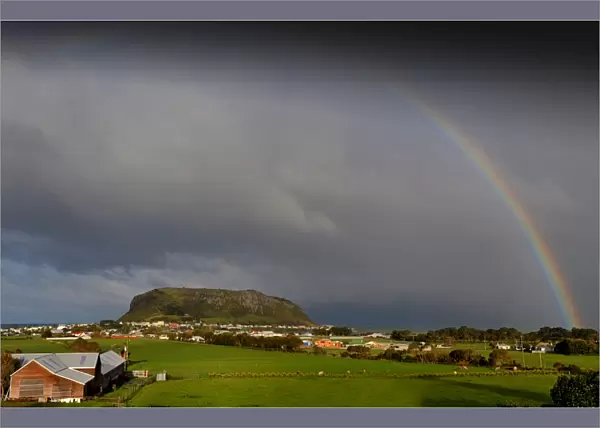 Rainbow appearing over Circular head at Stanley, in the northern area of the island state, Tasmania, Australia