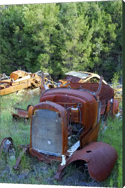 Rusting derelict old car parts in a farmyard, Flinders Island, Tasmania