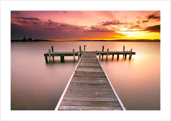 Pier in Lake Macquarie at sunset, Australia