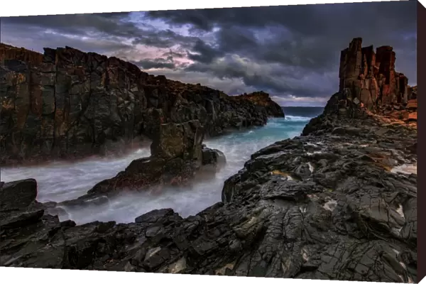 Dramatic rocky seascape sunset