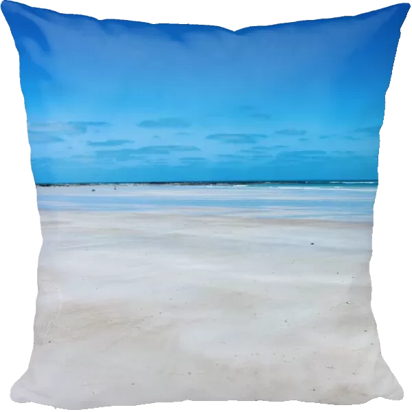 Pristine white sand of Cable Beach edged by the stunning turquoise water
