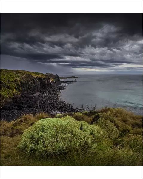 Pyramid Rock coastline and an approaching summer storm, Phillip Island, Bass coast, Victoria, Australia