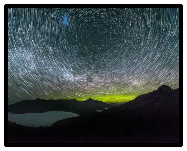 Aurora Australis or Southern Lights and Star Trails over Wineglass Bay, Freycinet Peninsula, Tasmania