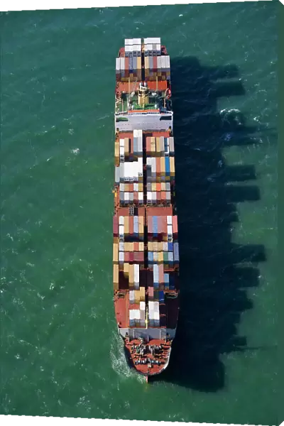 Container ship at sea, aerial view