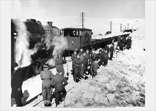 Troops clearing snow at Arten Gill on the London, Midland and Scottish Railways Settle