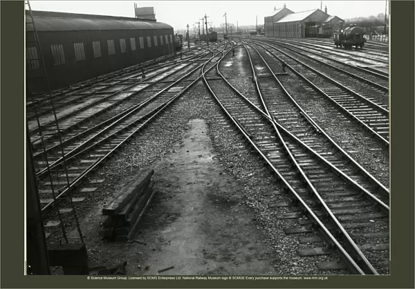 Ely, looking South from the station south signal box towards Cambridge. Engine shed on left