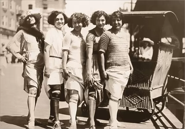 Line of Women Showing their Garter Belts  /  Circa 1920 s