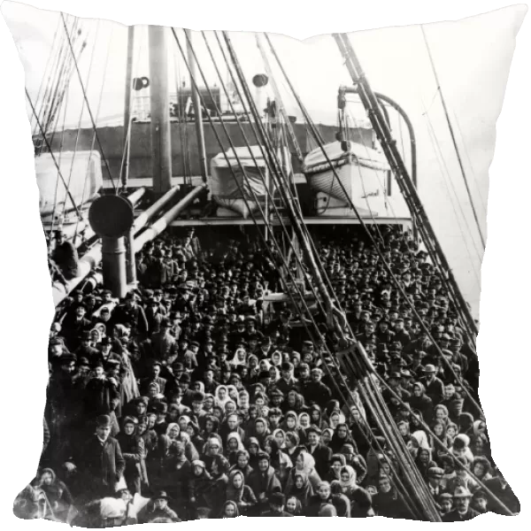 Coming To America; Immigrants pack the upper deck of the liner SS Patricia as it