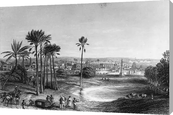 Madras. circa 1785: A group of travellers stop at a lake in the city of